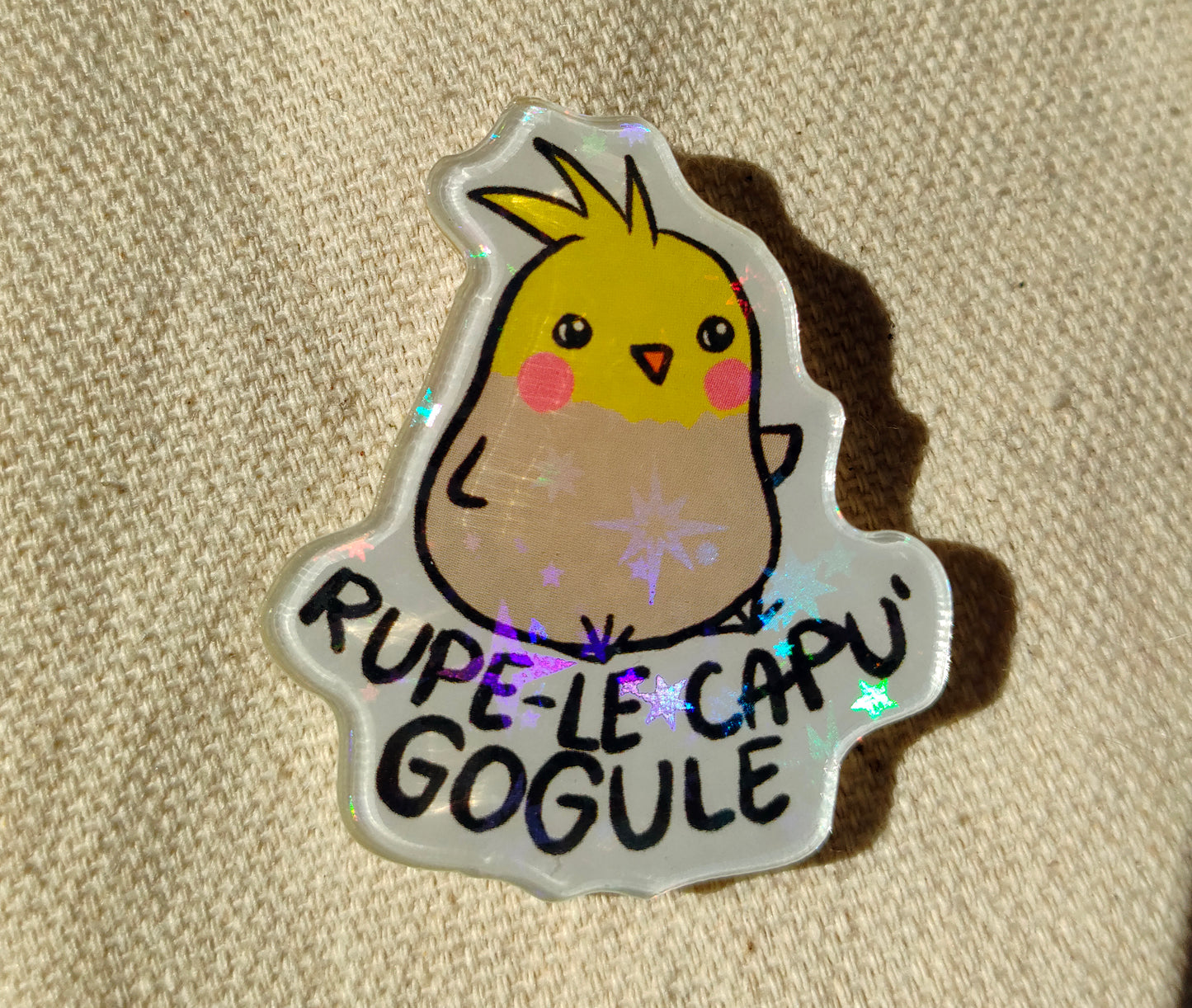 Rupe-le Capu Gogule holographic acrylic pin